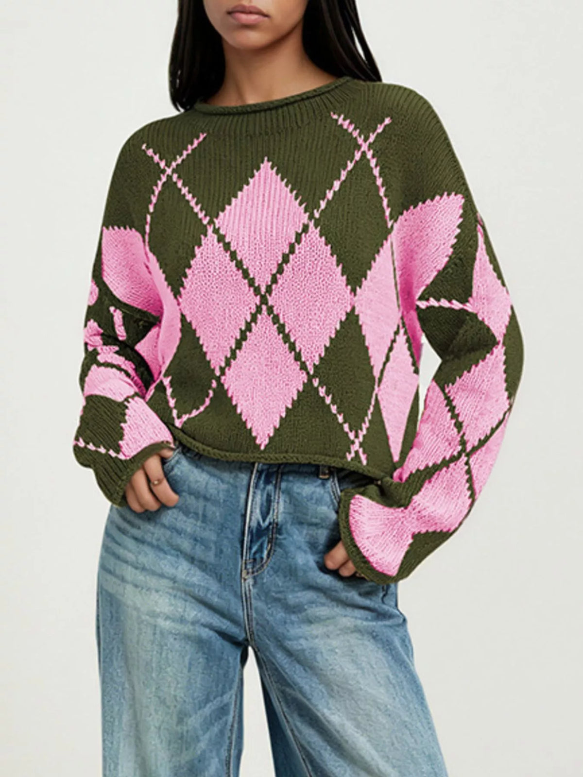 Cropped Argyle Knit Sweater in Green, front worn view with hem styled at the waist