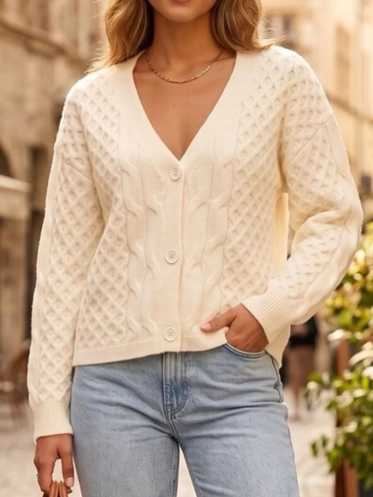 Cable-Knit V-Neck Button-Down Cardigan in Apricot, front view, V-neck and long sleeves